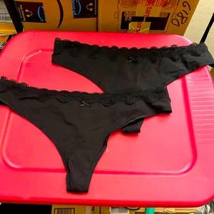 Torrid black lacy thongs